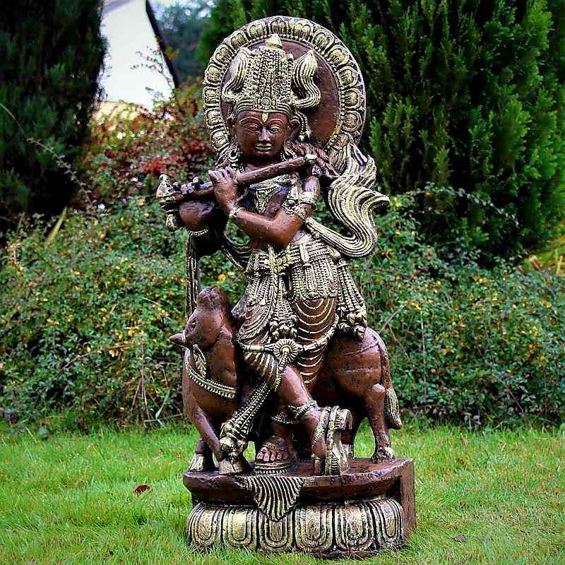 Steinfigur Goldener Krishna mit Flöte